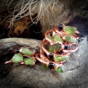 Onyx and peridot ring