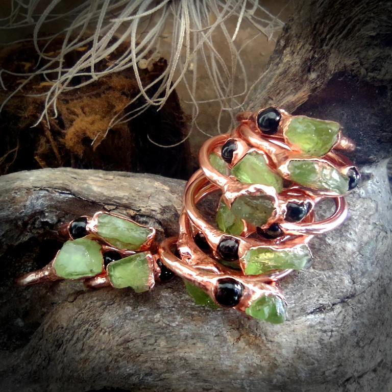Onyx and peridot ring