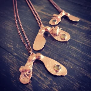 Winged seeds necklace with fly