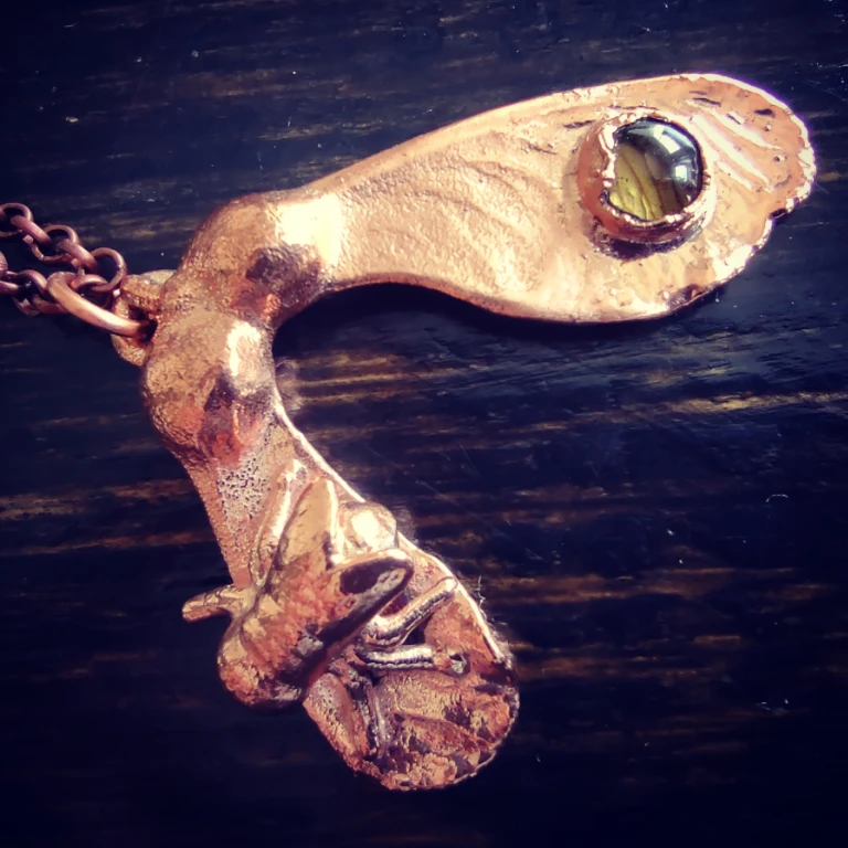 Winged seeds necklace with fly